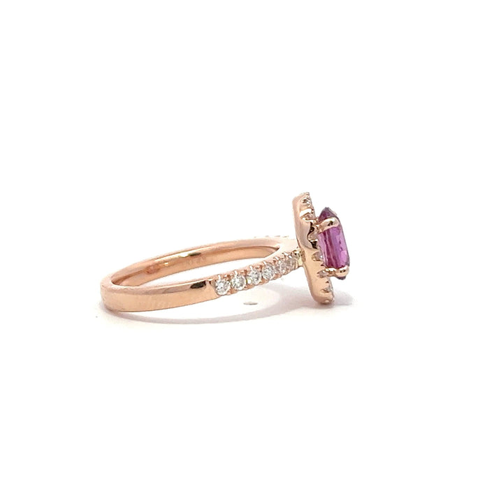 Pink sapphire rose gold engagement ring