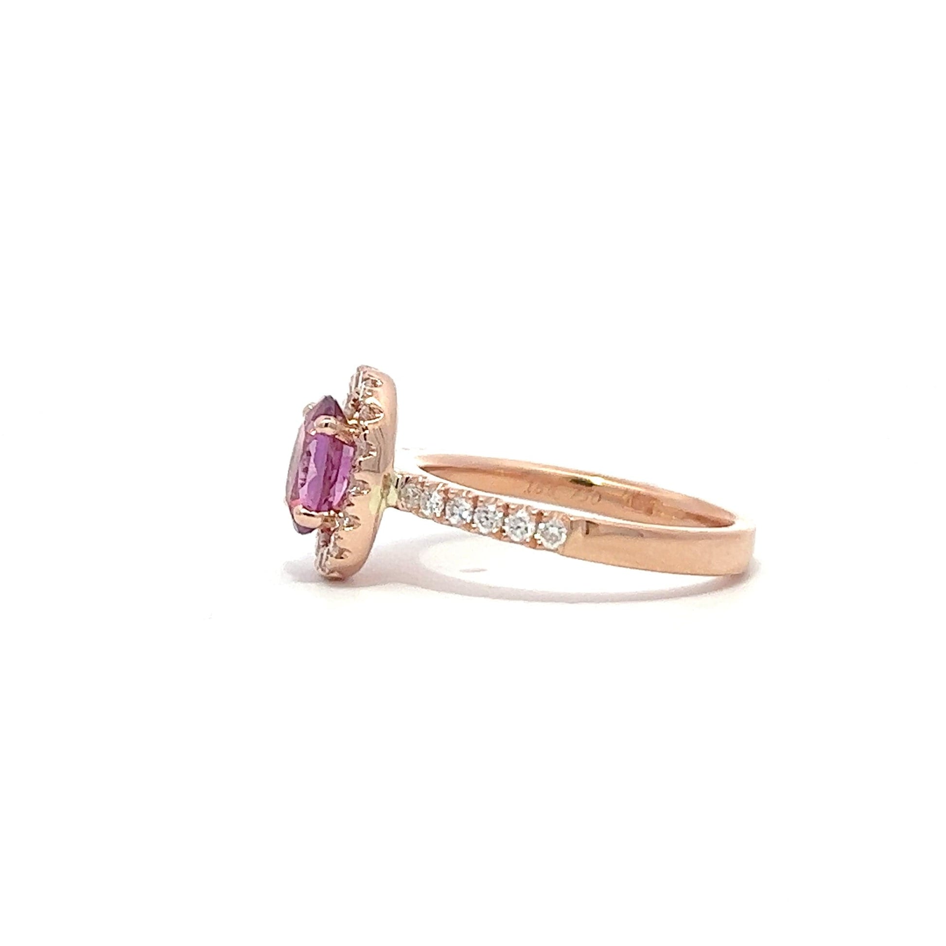 Pink sapphire rose gold engagement ring