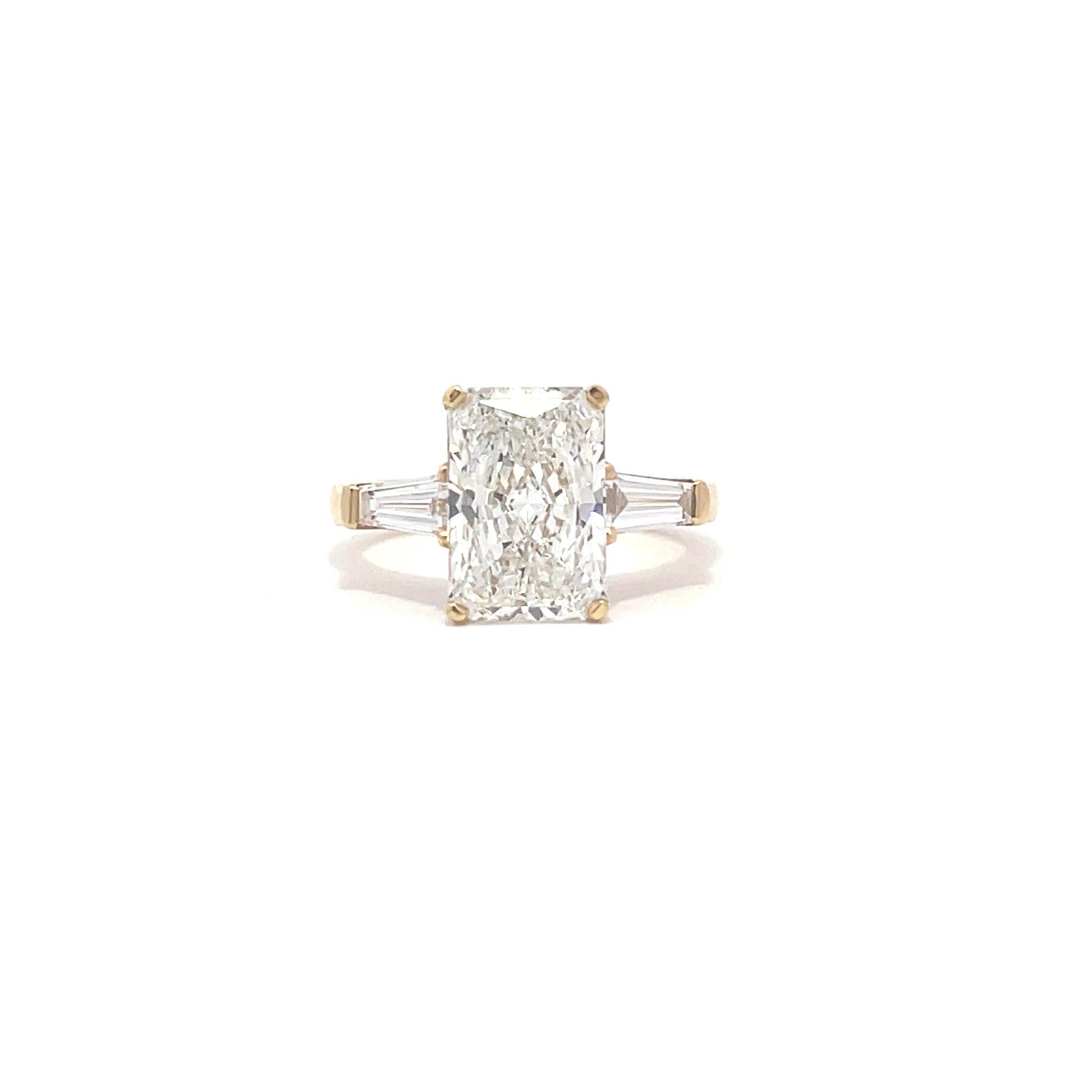 Radiant diamond trilogy ring