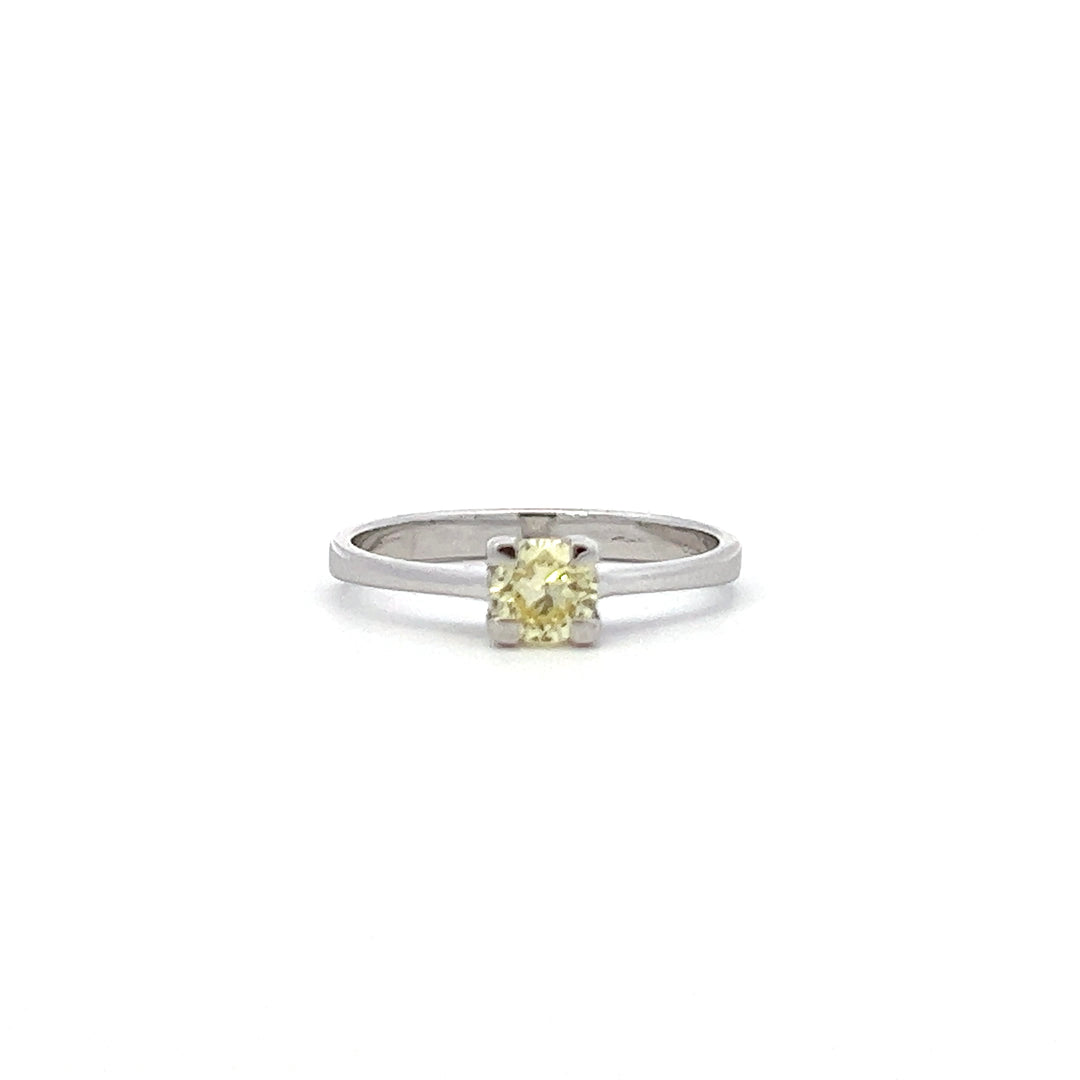 0.30ct Fancy light tinted yellow Diamond ring