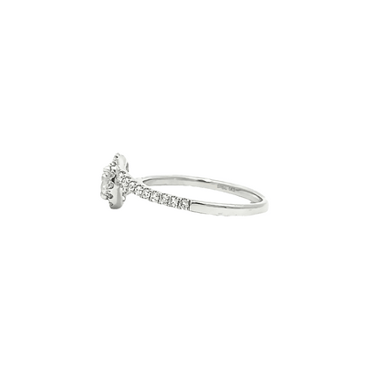 0.57ct H VS1 halo bypass engagement ring