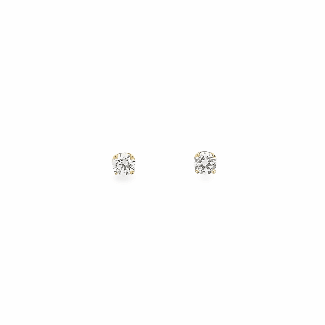 0.68ct G Si1 round cut yellow gold earrings