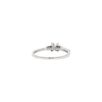 Trilogy round cut diamond engagement ring