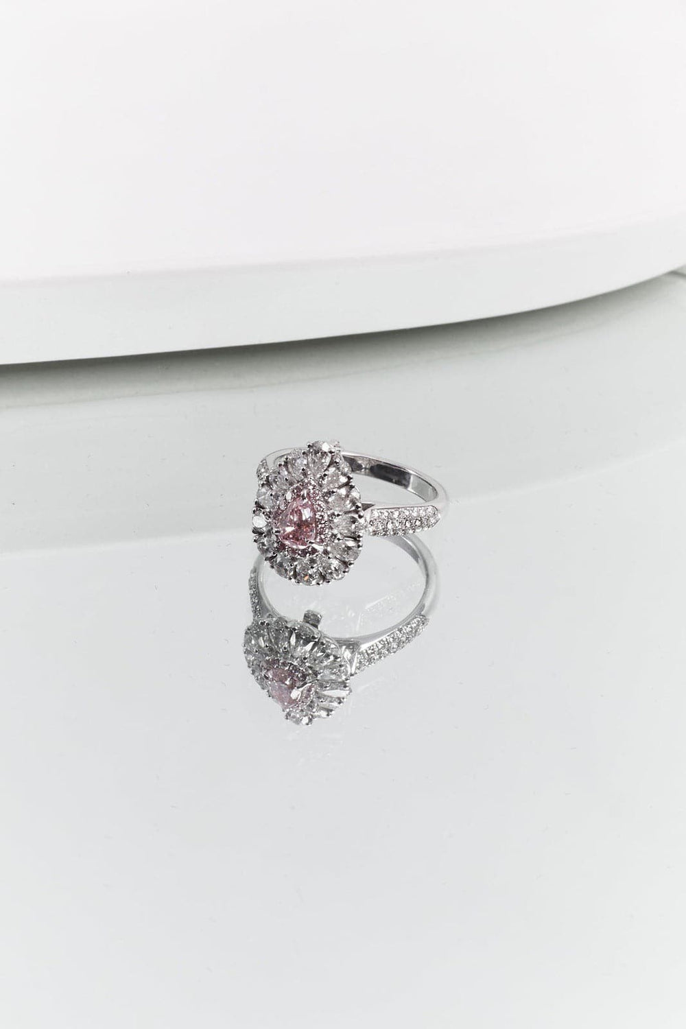Fancy pink pear diamond ring