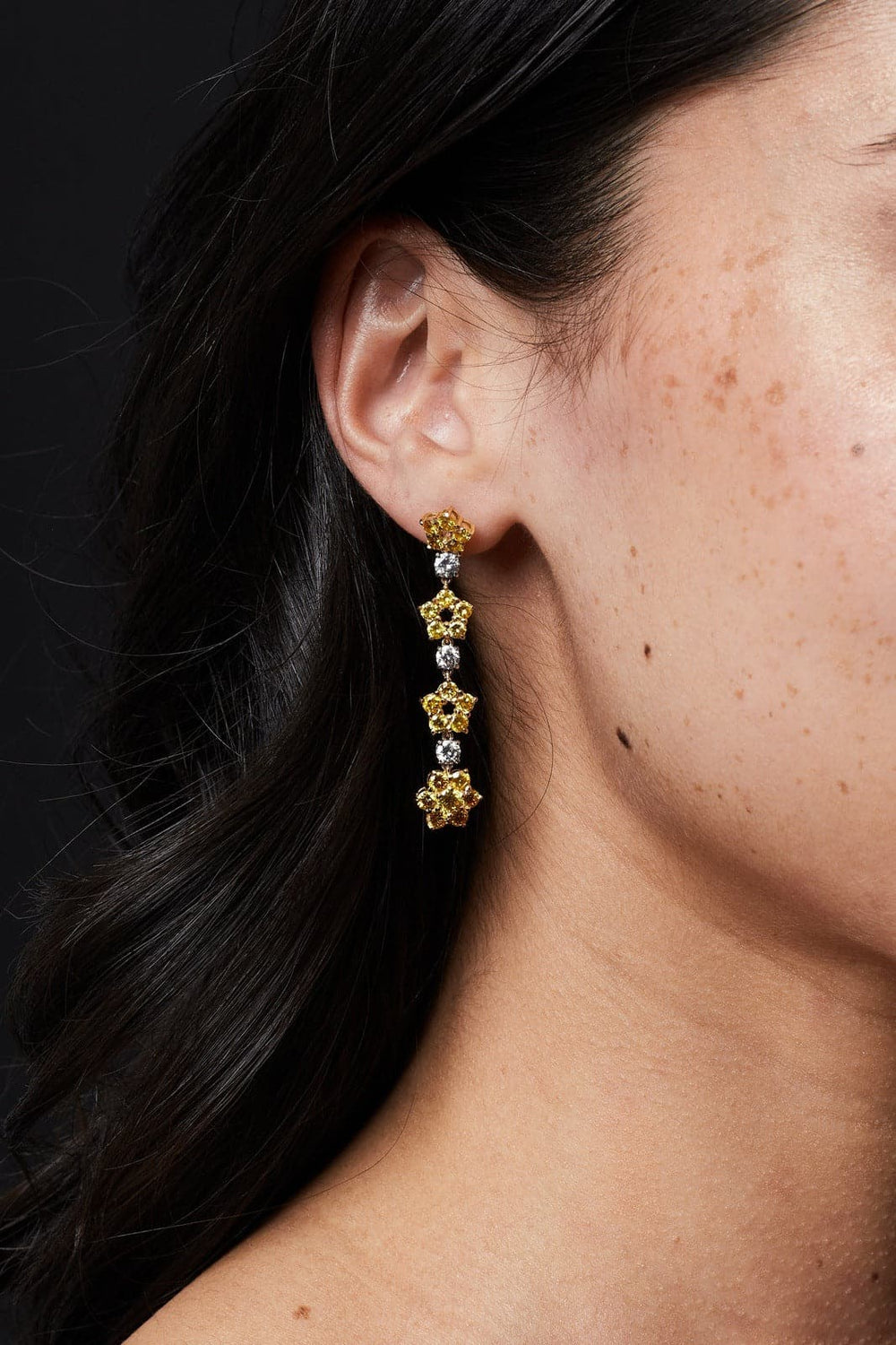 Fancy yellow vivid diamond flower earrings