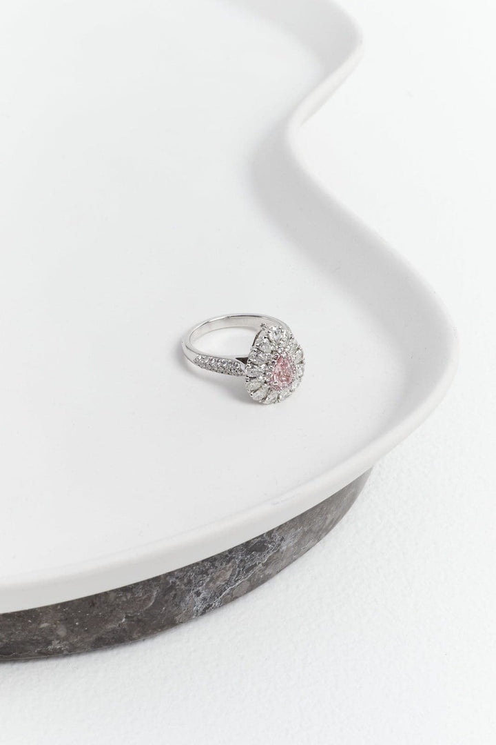 Fancy pink pear diamond ring